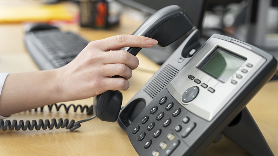 close-up-person-working-call-center
