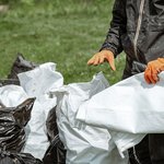 close-up-trash-bags-filled-with-trash-after-cleaning-environment