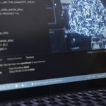 computer-scientist-using-laptop-data-center-updating-ai