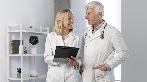 doctors-talking-checking-notes