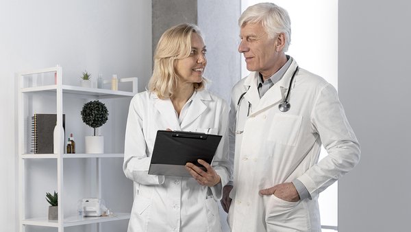 doctors-talking-checking-notes