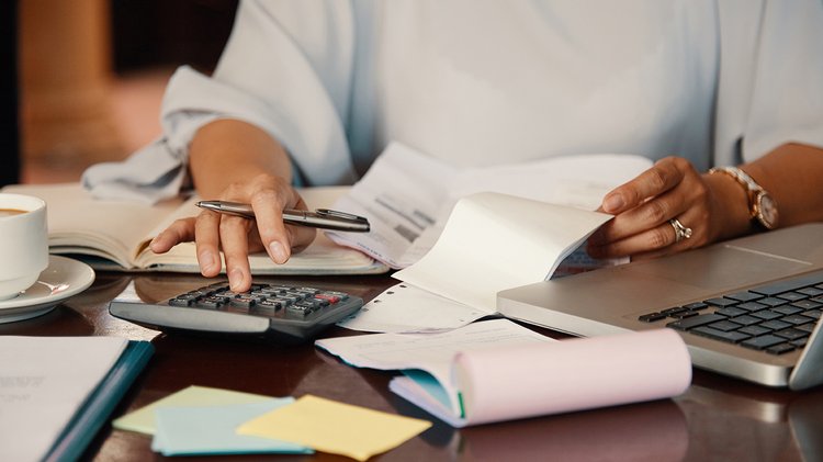 entrepreneur-working-with-bills