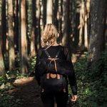 female-hiking-forest_23-2147870210