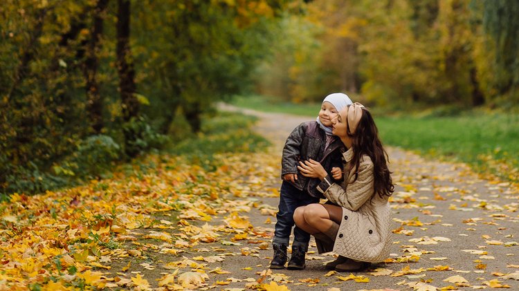 mom-son-walking-having-fun-together-autumn-park