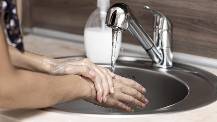 side-view-woman-washing-hands
