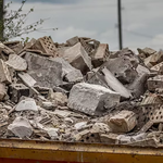 stone-dump-ruins-private-house-pile-construction-debris-stones_615860-447