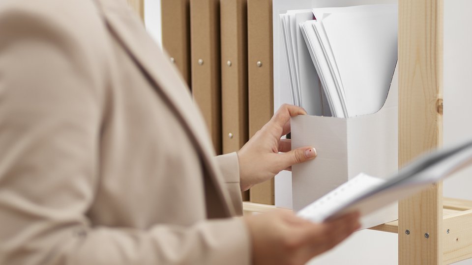 young-adult-organizing-documents